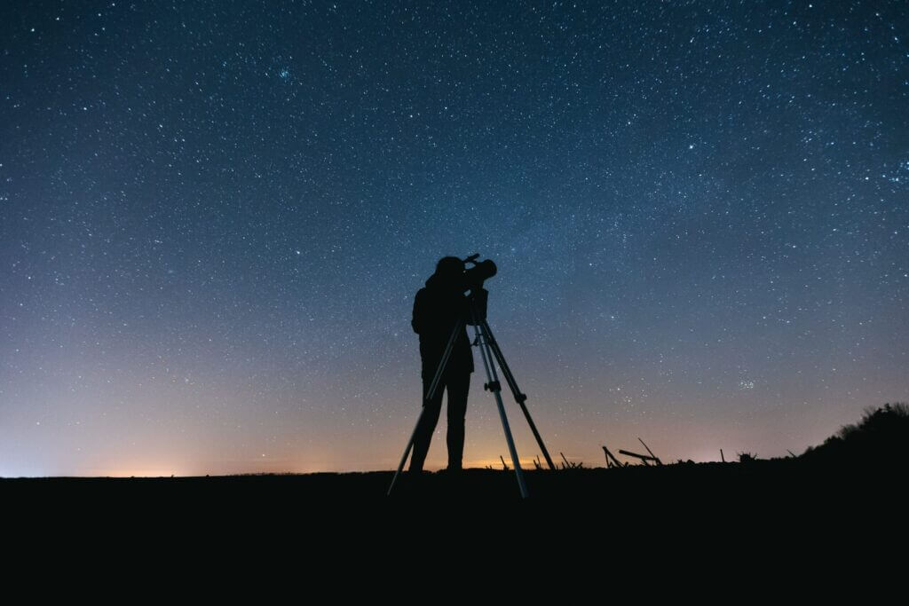 viewing the night sky through a telescope